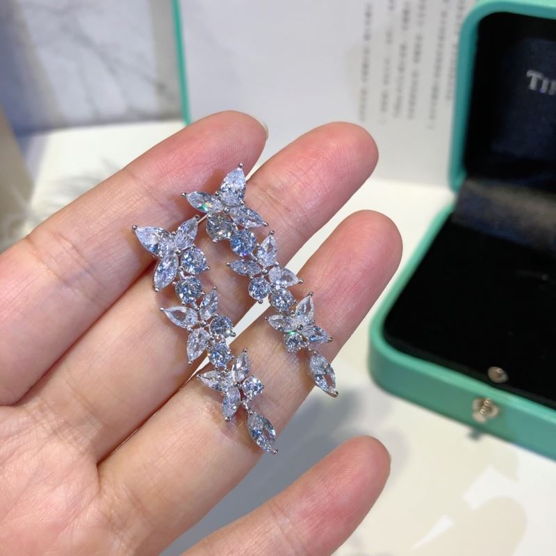 T*f*ny earrings